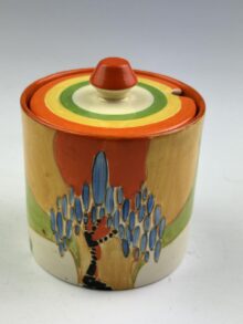 Clarice Cliff WINDBELLS pattern drum jampot with matched lid, 8cm, circa 1933.