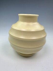 KEITH MURRAY Matt Straw (yellow) globe football vase, 16.5cm. ART DECO shape!
