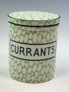 Maling green Cobblestone small storage jar marked CURRANTS, with lid, 10.5cm.