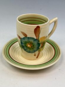Clarice Cliff HONEYDEW pattern, Lynton shape coffee cup + saucer, 7cm. Circa 1936.
