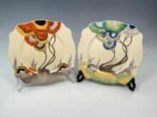 Two Clarice Cliff Leda shape plates in Rhodanthe & Viscaria, circa 1934, 22.5cm.