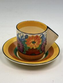 Clarice Cliff GAYDAY pattern conical shape coffee cup & saucer. Art Deco, circa 1931.