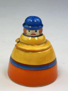 Clarice Cliff United Services covered mustard pot with figural cover, circa 1932.