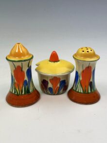 Clarice Cliff CROCUS pattern muffineer cruet set (3 pieces), 9cm, Art Deco, circa 1932.