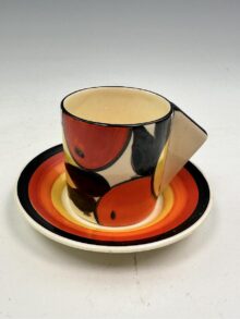 Clarice Cliff ORANGES & LEMONS pattern conical coffee cup & saucer. Circa 1932.