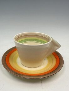 Clarice Cliff BANDED conical coffee cup and matched saucer. Art Deco, circa 1933.