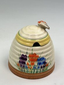 Clarice Cliff CROCUS pattern beehive preserve or honey pot. Circa late 1930s.