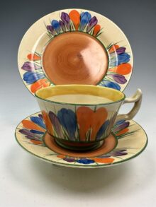 Clarice Cliff early CROCUS pattern Athens trio (cup, saucer & plate), circa 1929.
