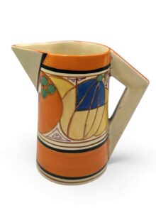 Clarice Cliff MELON (orange) pattern conical jug, 15cm, circa 1930. Art Deco original.