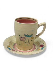 Clarice Cliff BON JOUR (pink) pattern, Lynton (ribbed) coffee cup, 7.5cm, circa 1935.