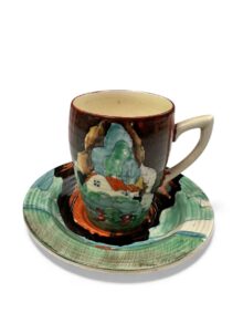 Clarice Cliff FOREST GLEN pattern, Lynton (ribbed) coffee cup, 7.5cm, circa 1936.
