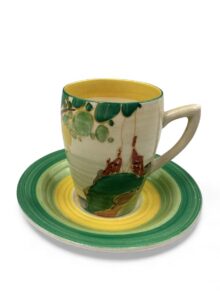 Clarice Cliff SECRETS, a Lynton shape coffee can and saucer. Art Deco circa 1933.