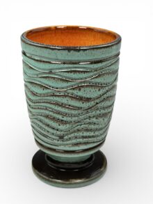 Poole Atlantis goblet vase with wavy lines pattern. Stamped AW to base, 14.5cm.