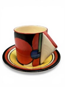 Clarice Cliff Picasso Flower (red) conical coffee can & saucer, circa 1930.