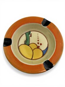 Clarice Cliff Summerhouse pattern ashtray, circa 1932, 11.5cm diameter.