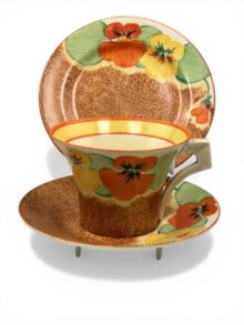 Clarice Cliff NASTURTIUM daffodil shape trio (cup, saucer & plate), circa 1936.