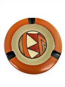 Clarice Cliff SUNBURST pattern ashtray, circa 1930, 11.5cm diameter. Rarity.