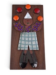 Scarce HORNSEA POTTERY Juggling Clown Muramic wall plaque. Circa 1970s.