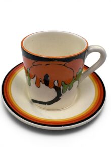 Clarice Cliff Woodland tankard shape coffee can & matched saucer, circa 1930.