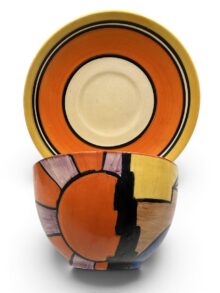 Clarice Cliff SUNRAY pattern globe shape cup and saucer. Art Deco, circa 1930.