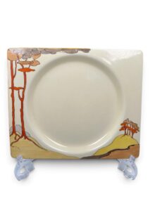 Clarice Cliff medium size CORAL FIRS pattern Biarritz plate, 22.5cm , circa 1936.